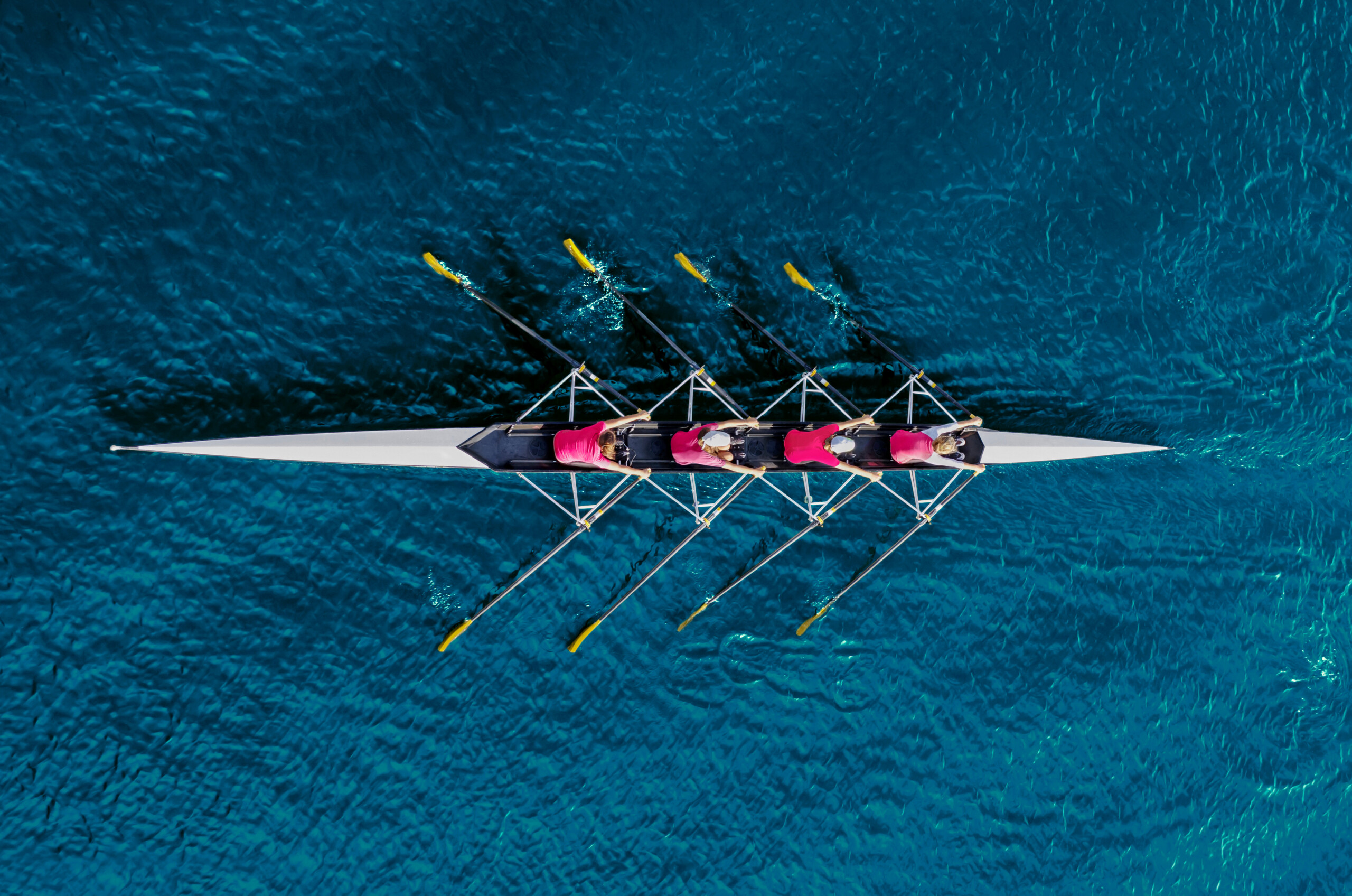 Rowing team on boat